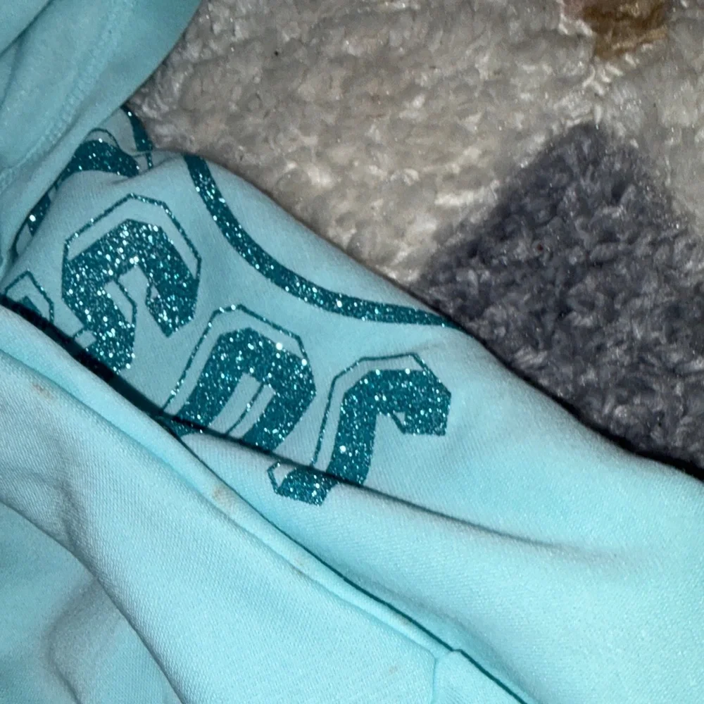 Justice Light Blue Smiley Face Hoodie